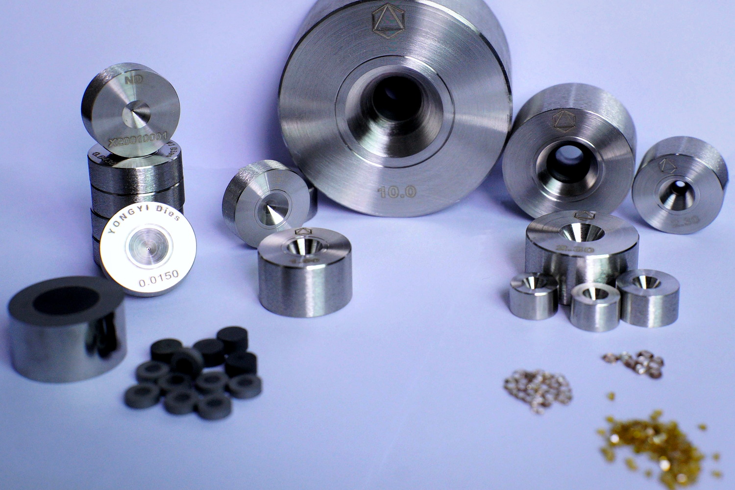 Polycrystalline diamond wire drawing dies